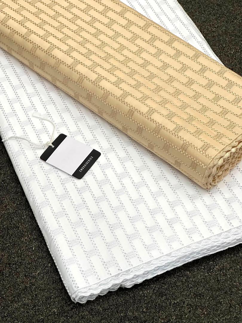 Premium Polished Lace - White and Gold colour, a premium Polished Lace - Unisex fabric available to buy in Lagos, Nigeria from SBM Fabrics Hub.